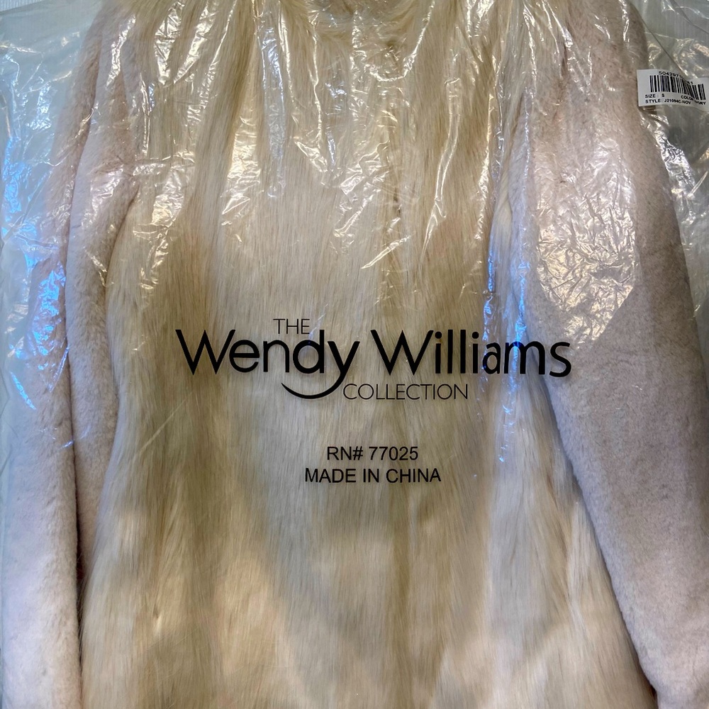 White faux fur jacket by Wendy Williams.  New; never worn. Size small